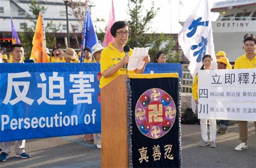 '图2：沈阳法轮功学员肖岩冰在集会上发言。。'